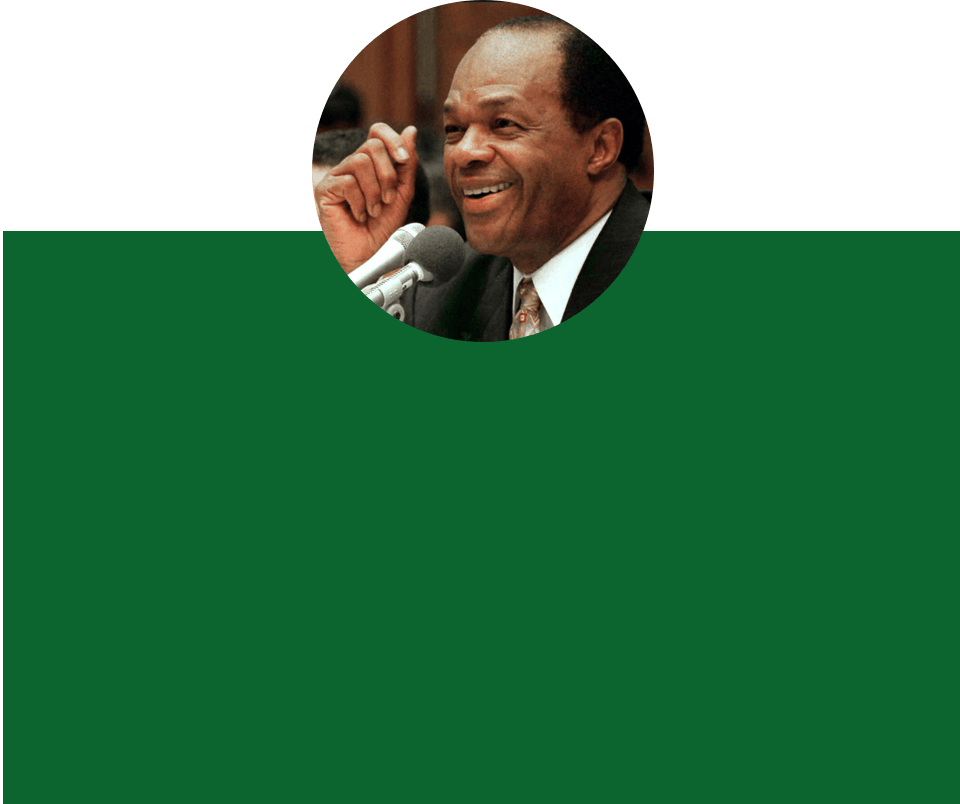 Circular image of Marion Barry over a green background